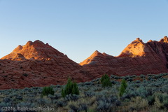 At sunrise, on the sand dunes just started from the Wire Pass access to the Coyote Buttes North area